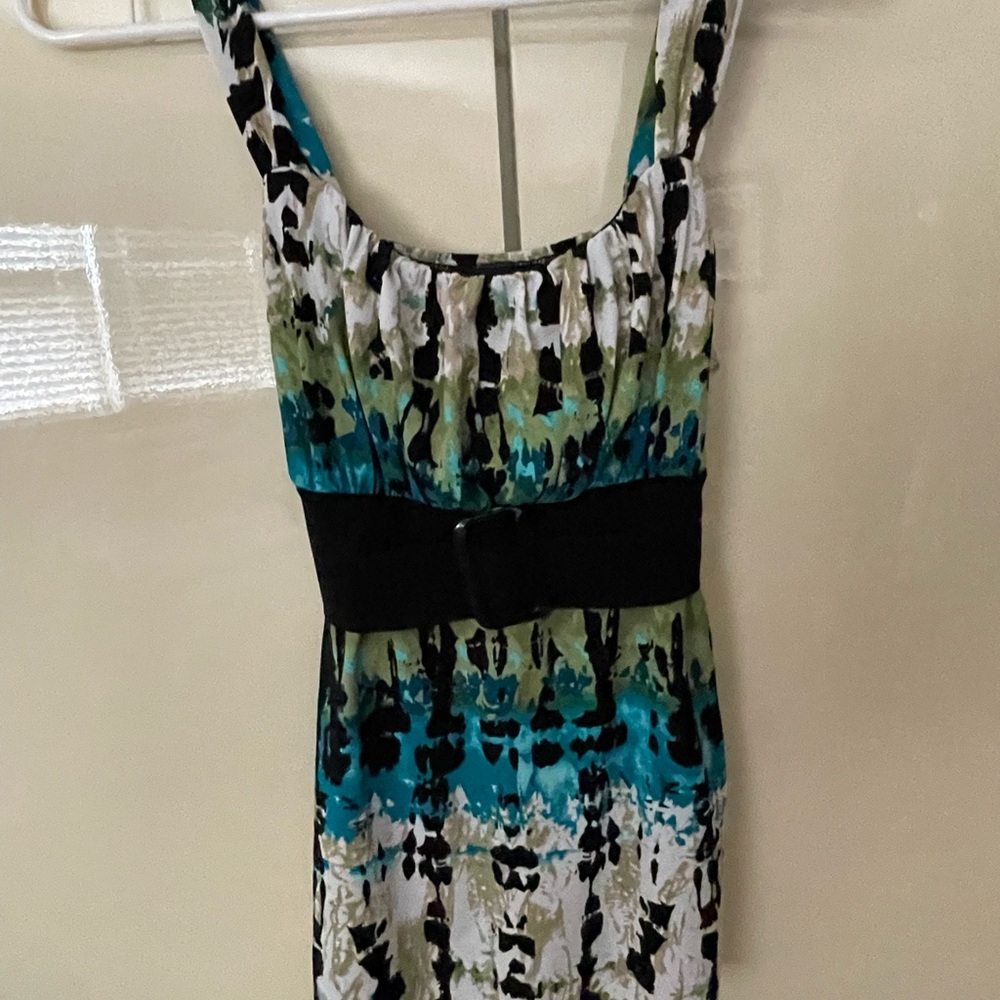 Multi-colored top. Tie in back.  Please see picture for style and shape